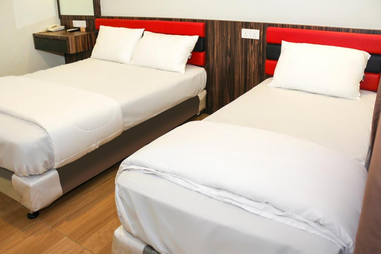 Oyo 90027 Happy Hotel Джохор-Бару Экстерьер фото